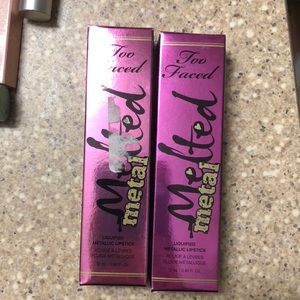 Two melted metal Too Faced lipsticks